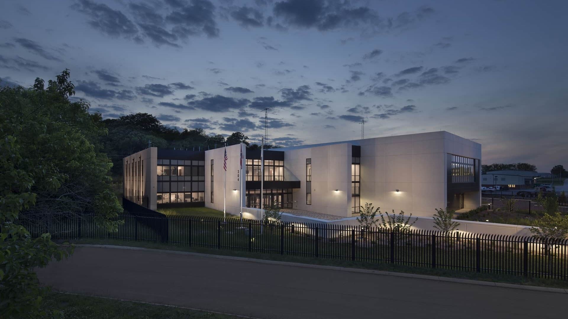 Exterior of the Public Safety Center at night.